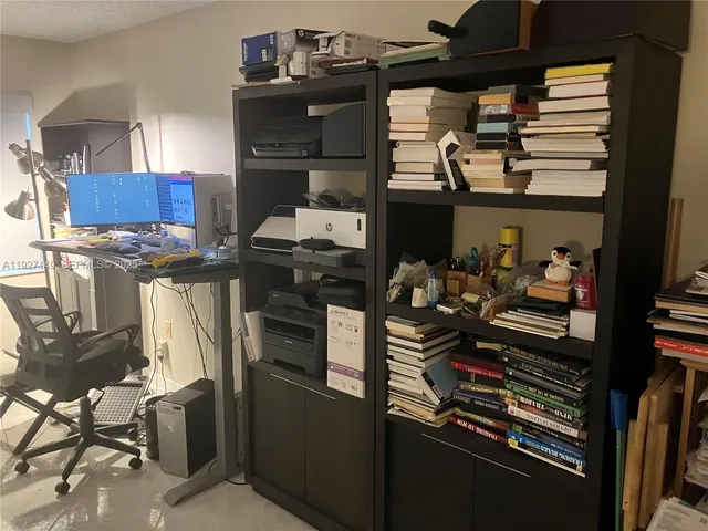a kitchen with a stove and cabinets