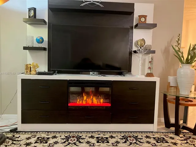 a living room with a fireplace
