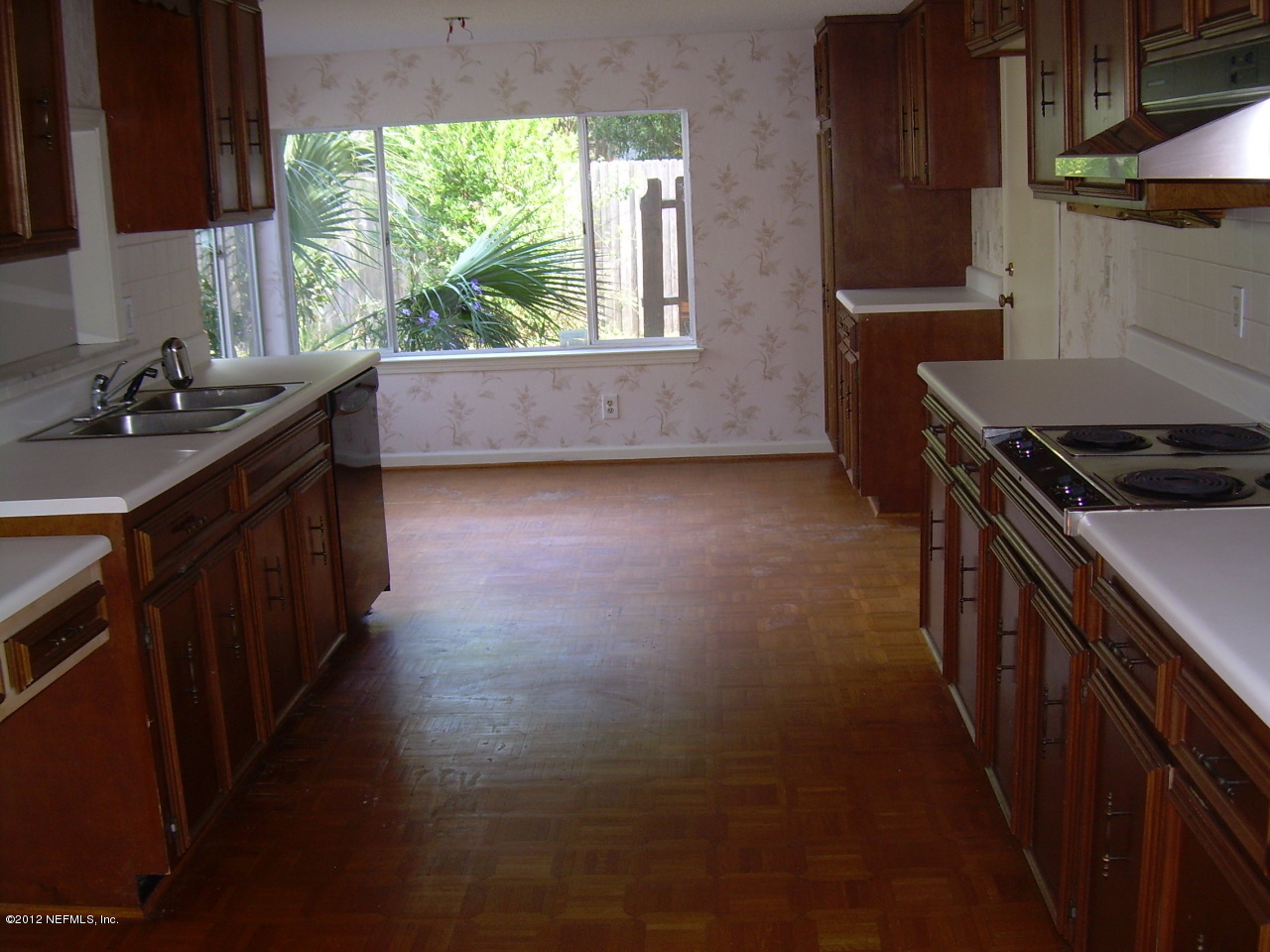 5717 Swamp Fox Road Jacksonville, FL 32210 - Photo 4 of 9 SWAMP FOX VIEW OF THE KITCHEN
