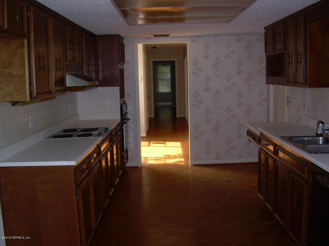 5717 Swamp Fox Road Jacksonville, FL 32210 - Photo 5 of 9 SWAMP FOX ANOTHER VIEW OF KITCHEN