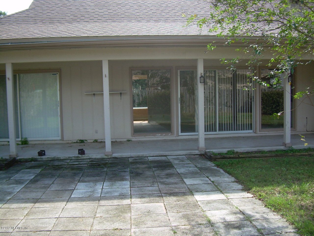 5717 Swamp Fox Road Jacksonville, FL 32210 - Photo 8 of 9 SWAMP FOX COVERED PATIO