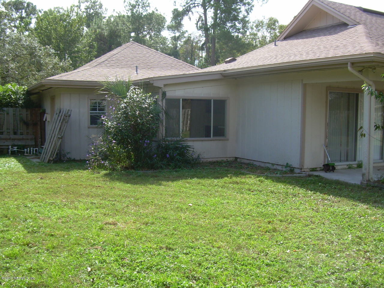 5717 Swamp Fox Road Jacksonville, FL 32210 - Photo 9 of 9 SWAMP FOX BACK VIEW OF HOUSE