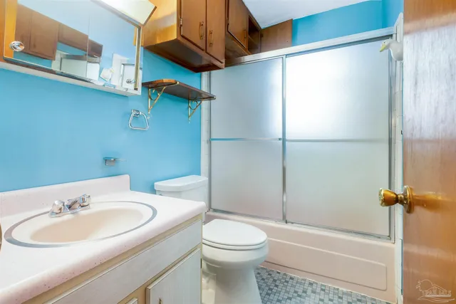 a view of a big room with an empty room and a window