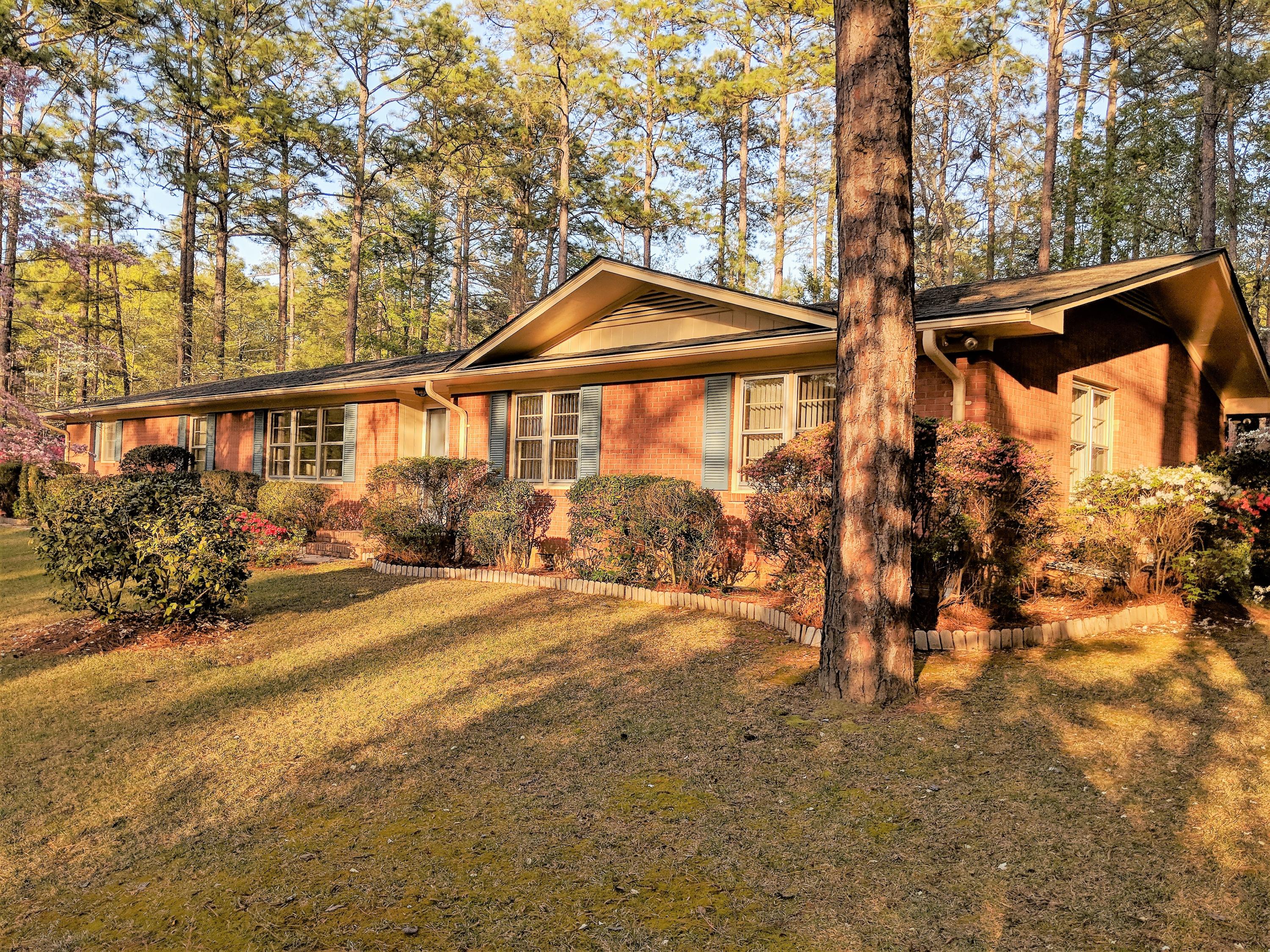 405 Hill Road Southern Pines, NC 28387 - Photo 1 of 35 Set in the tall pines in the rolling hills of Southern Pines