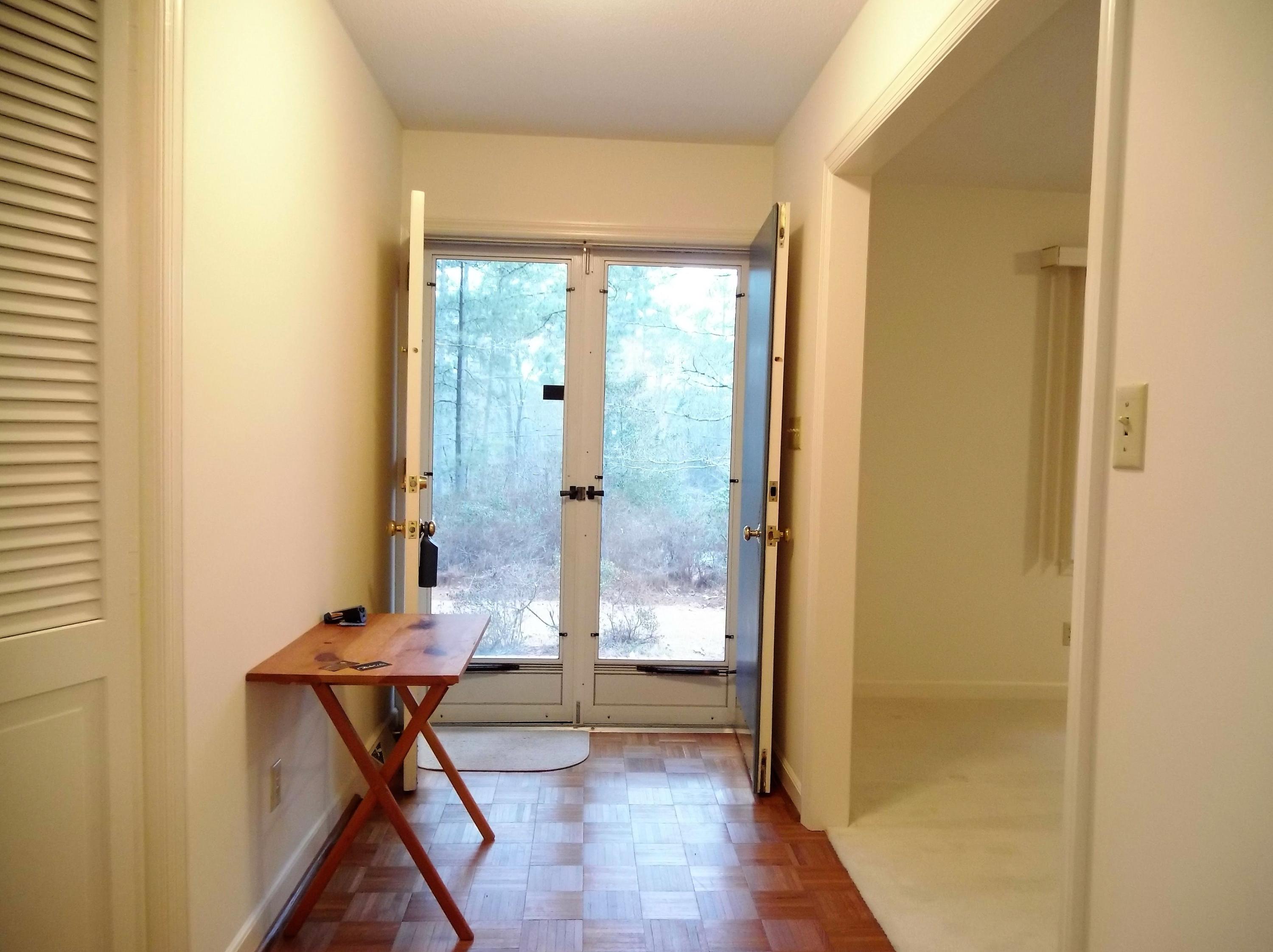 405 Hill Road Southern Pines, NC 28387 - Photo 6 of 35 Double door foyer and wood floors eases you from the outdoors to the heart of the home.