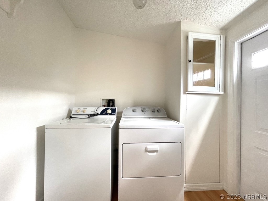 4391 Maple Avenue Edgewater, FL 32141 - Photo 12 of 50 a utility room with dryer and washer