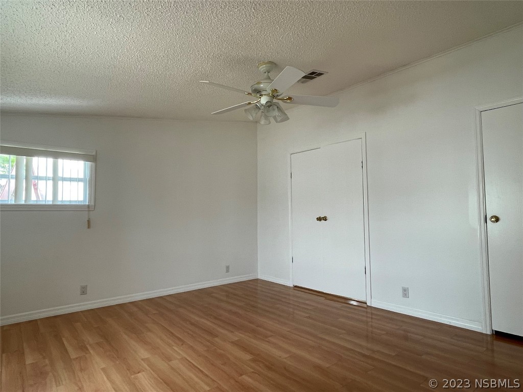 4391 Maple Avenue Edgewater, FL 32141 - Photo 26 of 50 wooden floor in an empty room