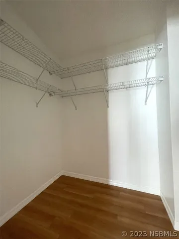 a room with windows and a chandelier