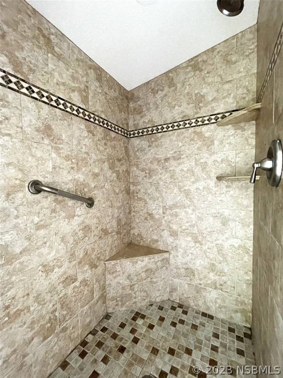 4391 Maple Avenue Edgewater, FL 32141 - Photo 32 of 50 a bathroom with a shower