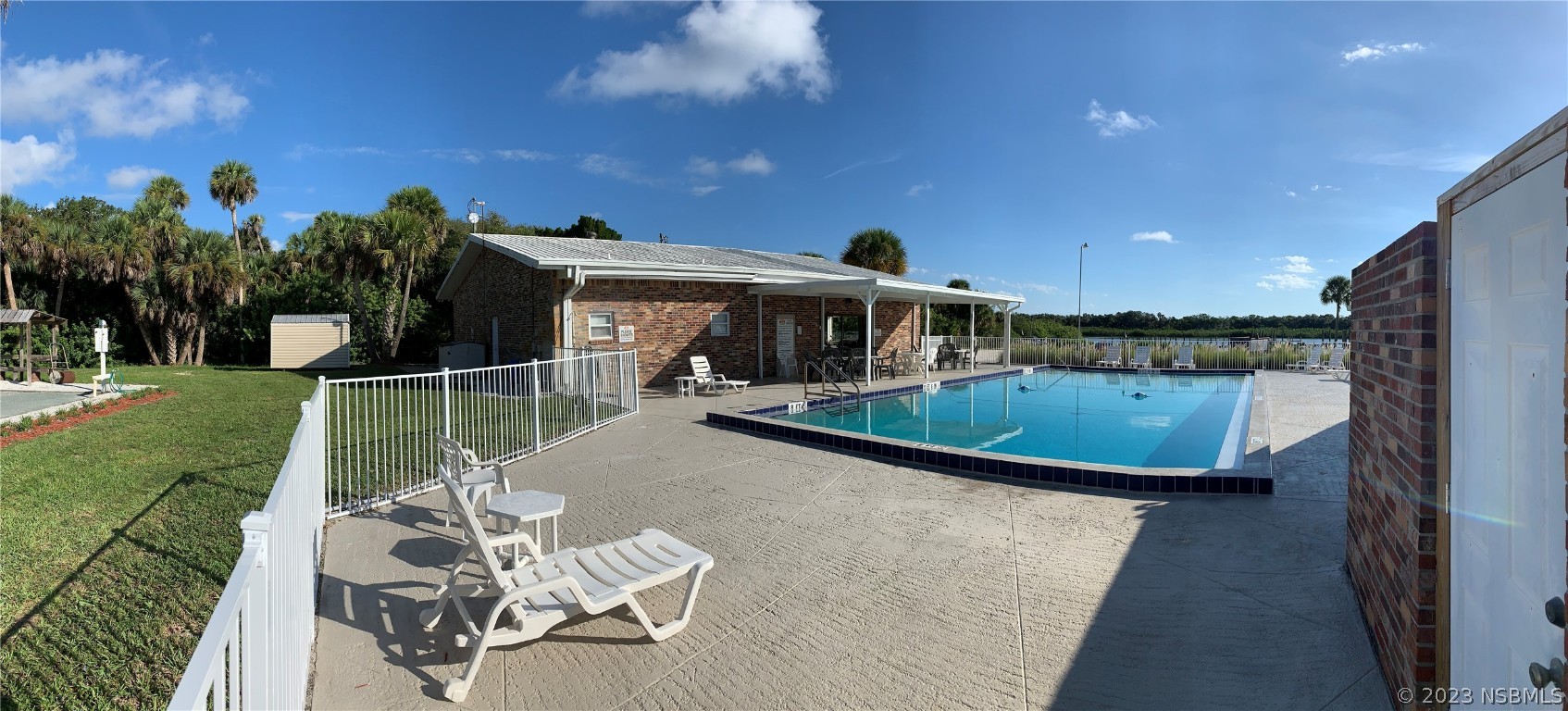 4391 Maple Avenue Edgewater, FL 32141 - Photo 38 of 50 a view of a house with backyard porch and sitting area
