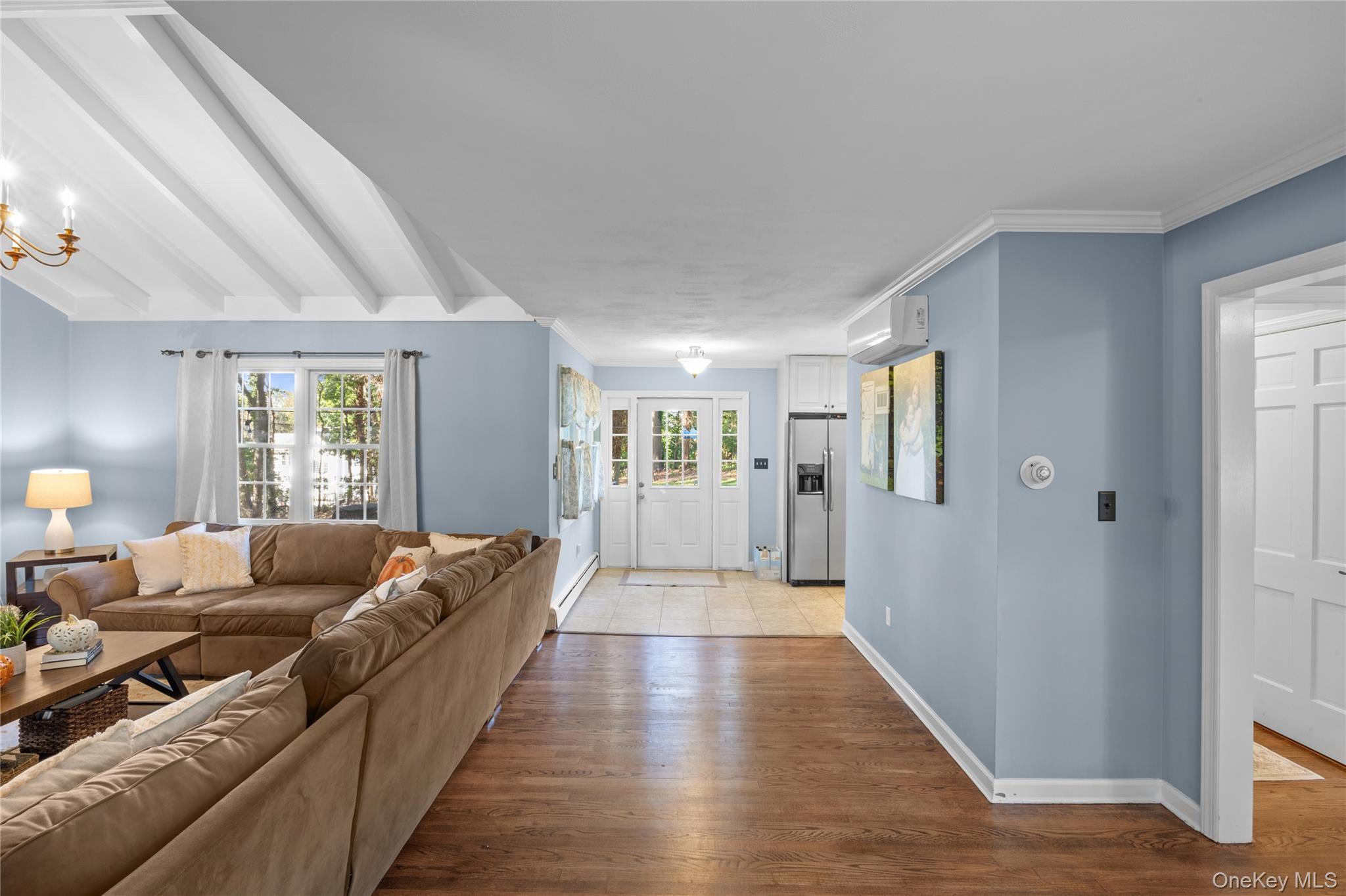 7 Shaker Hollow Road Setauket, NY 11733 - Photo 14 of 38 a living room with furniture and wooden floor