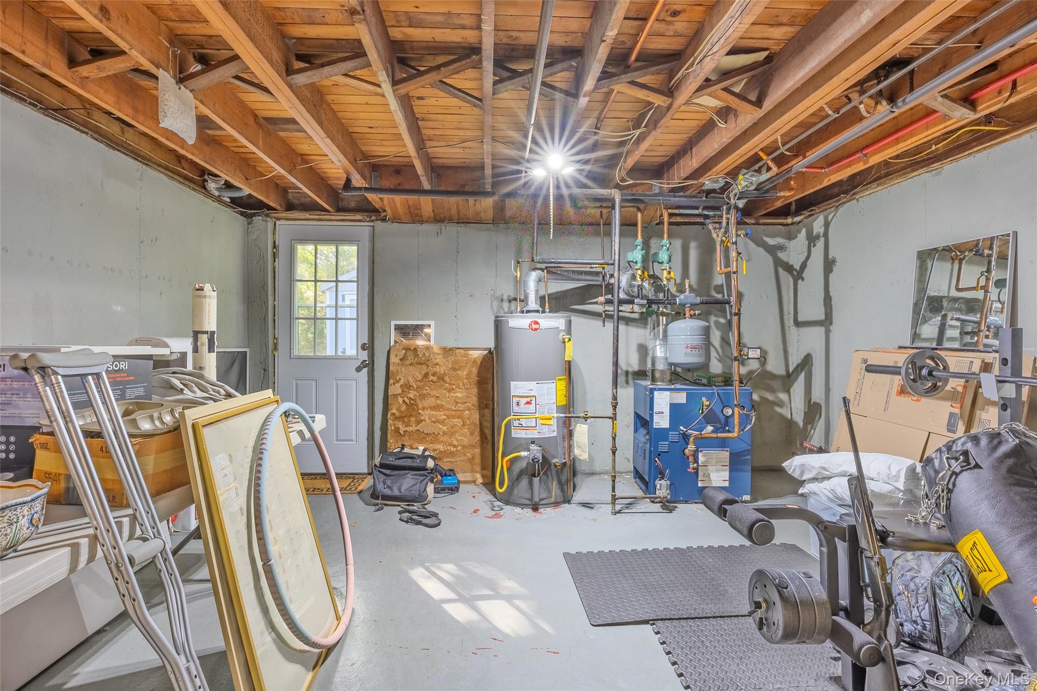 7 Shaker Hollow Road Setauket, NY 11733 - Photo 27 of 38 a view of a room with gym equipment