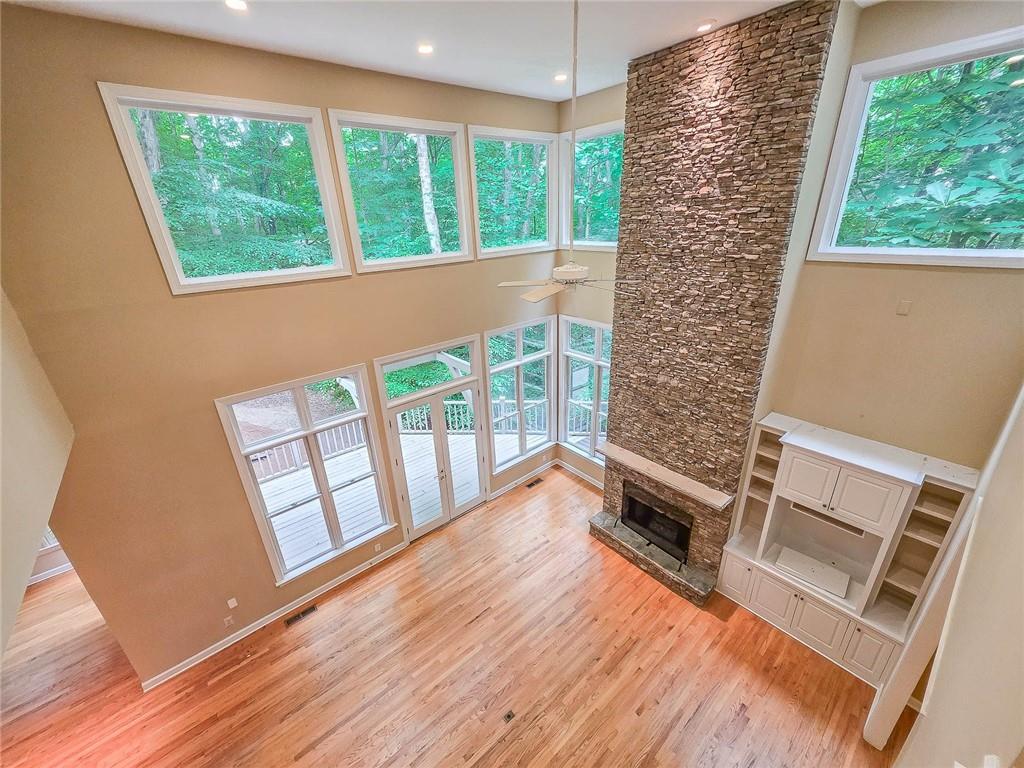 3712 Frederica Road Northwest Berkeley Lake, GA 30096 - Photo 25 of 49 a view of an entryway with wooden floor and windows
