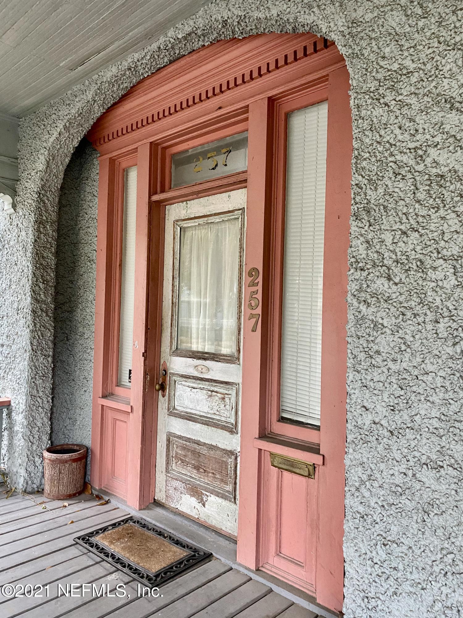 a front view of a house with a door