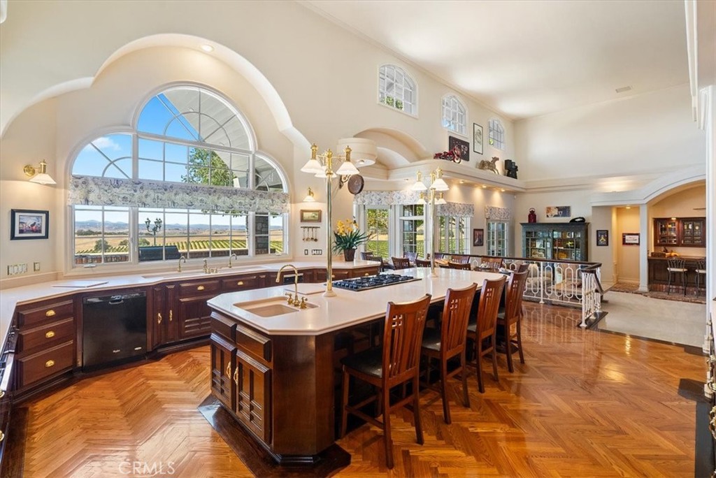 8283 Cross Canyons Road San Miguel, CA 93451 - Photo 23 of 73 a large kitchen with lots of table and chairs