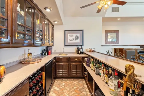 a view of workspace with a window and cabinet