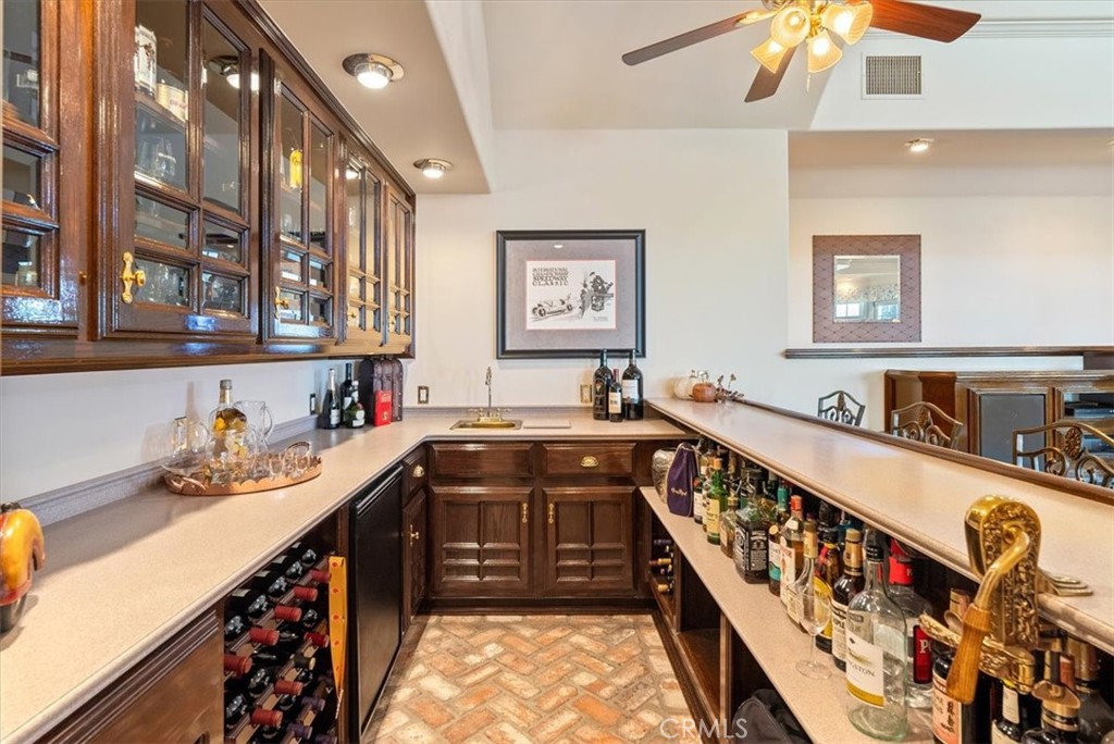8283 Cross Canyons Road San Miguel, CA 93451 - Photo 28 of 73 a kitchen with stainless steel appliances a sink and a stove