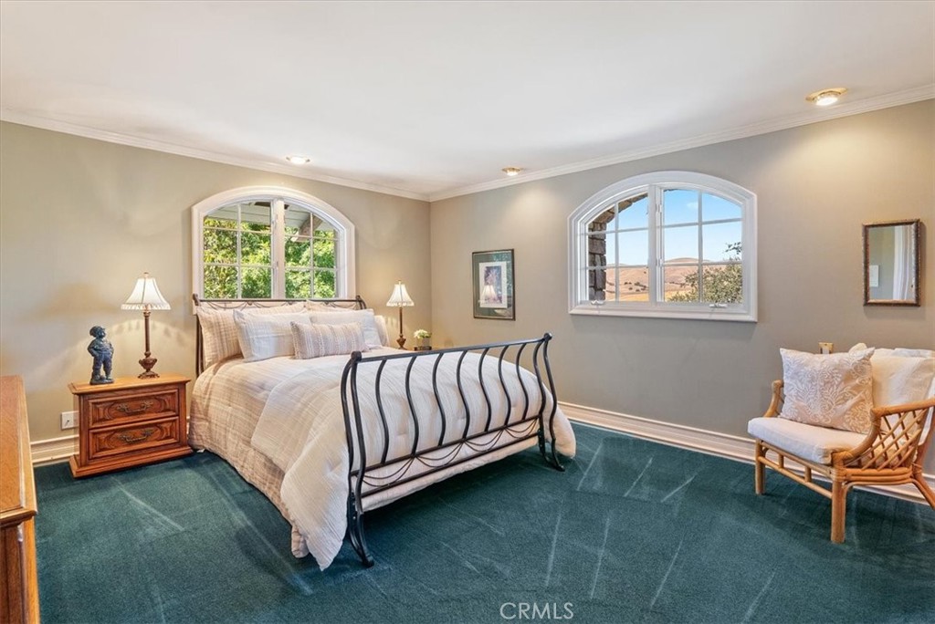 8283 Cross Canyons Road San Miguel, CA 93451 - Photo 48 of 73 a bedroom with a bed and window