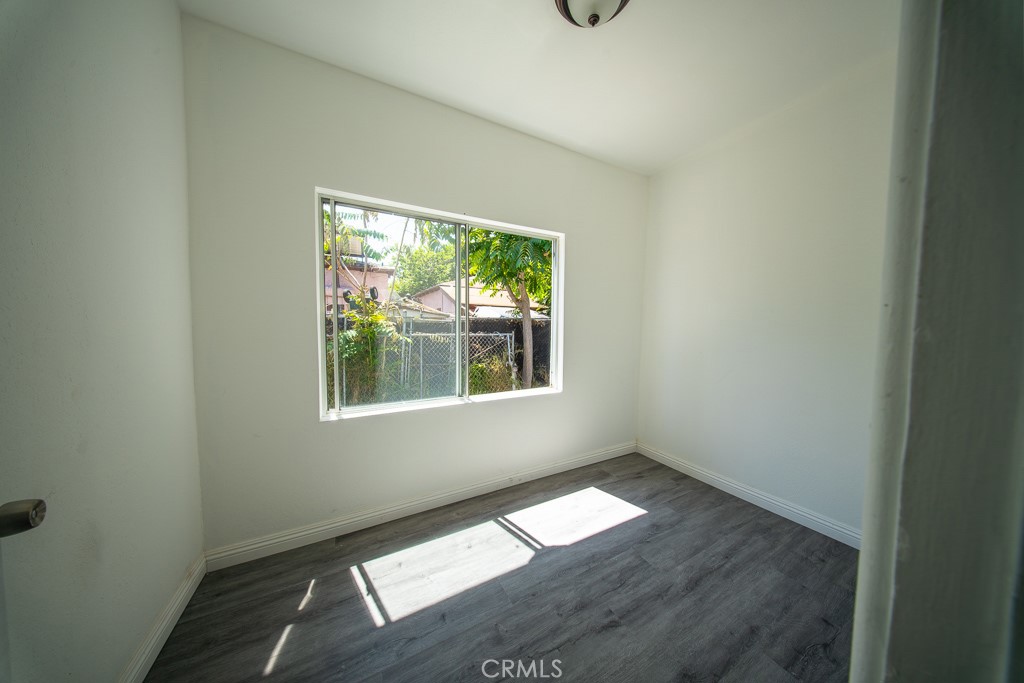 843 West Brazil Street Compton, CA 90220 - Photo 11 of 17 a view of empty room with window