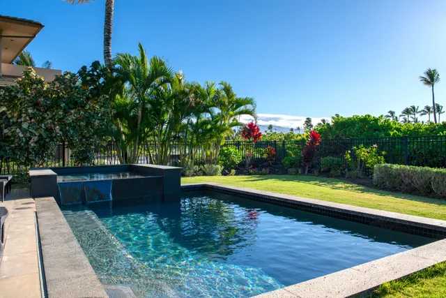 a view of swimming pool with a patio