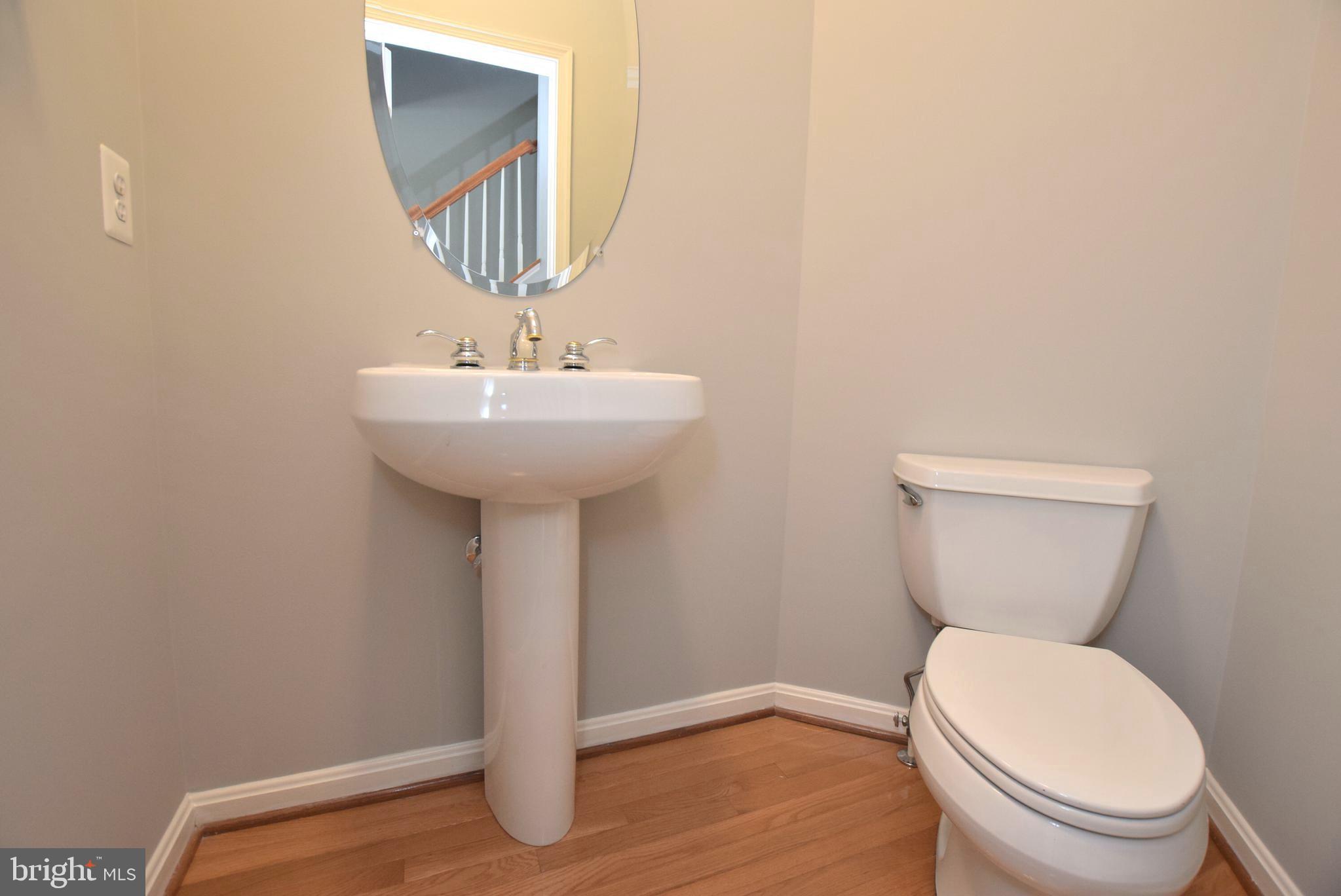 9179 Ribbon Falls Loop Bristow, VA 20136 - Photo 15 of 29 Main Level Powder Room