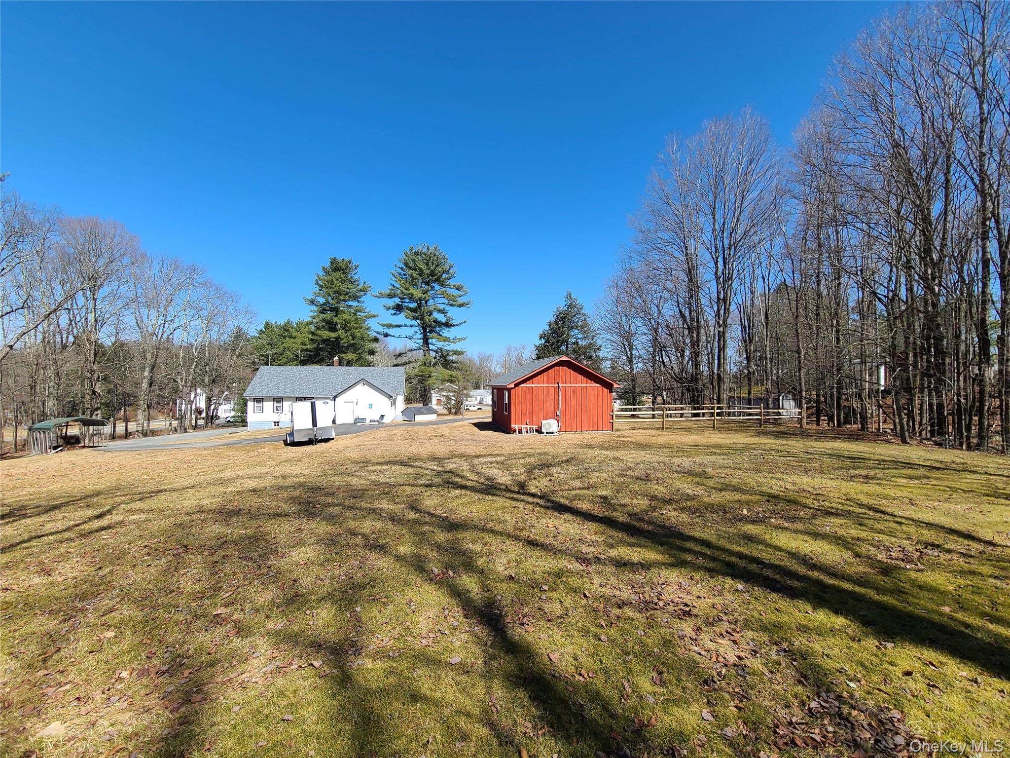 1095 State Rt 17B Mongaup Valley, NY 12762 - Photo 37 of 47 View of yard, barn and fence
