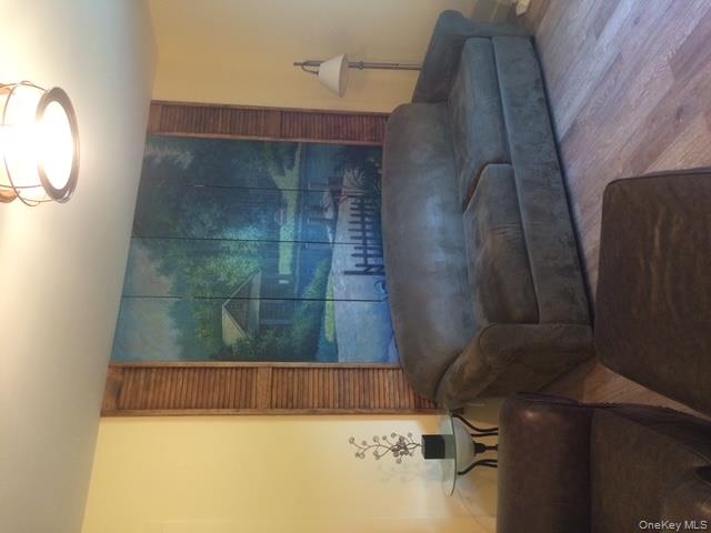 1095 State Rt 17B Mongaup Valley, NY 12762 - Photo 45 of 47 Living room with wood finished floors