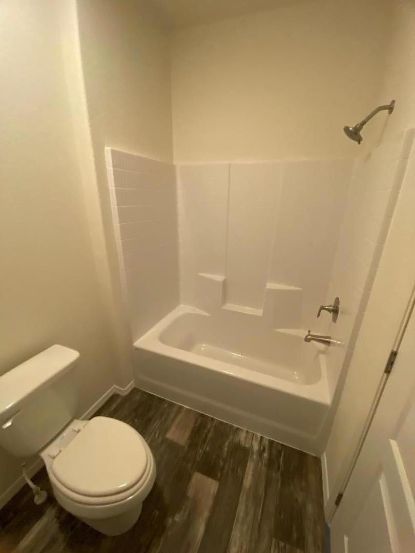 6165 Pony Express Trail, Unit 32 Pollock Pines, CA 95726 - Photo 2 of 7 a bathroom with a sink and a toilet