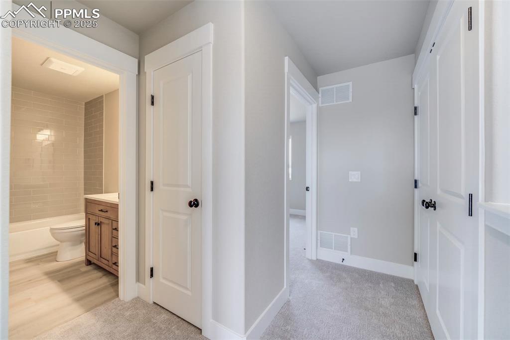 205 High Meadows Drive Florence, CO 81226 - Photo 17 of 28 a view of a bathroom with a toilet shower and a sink