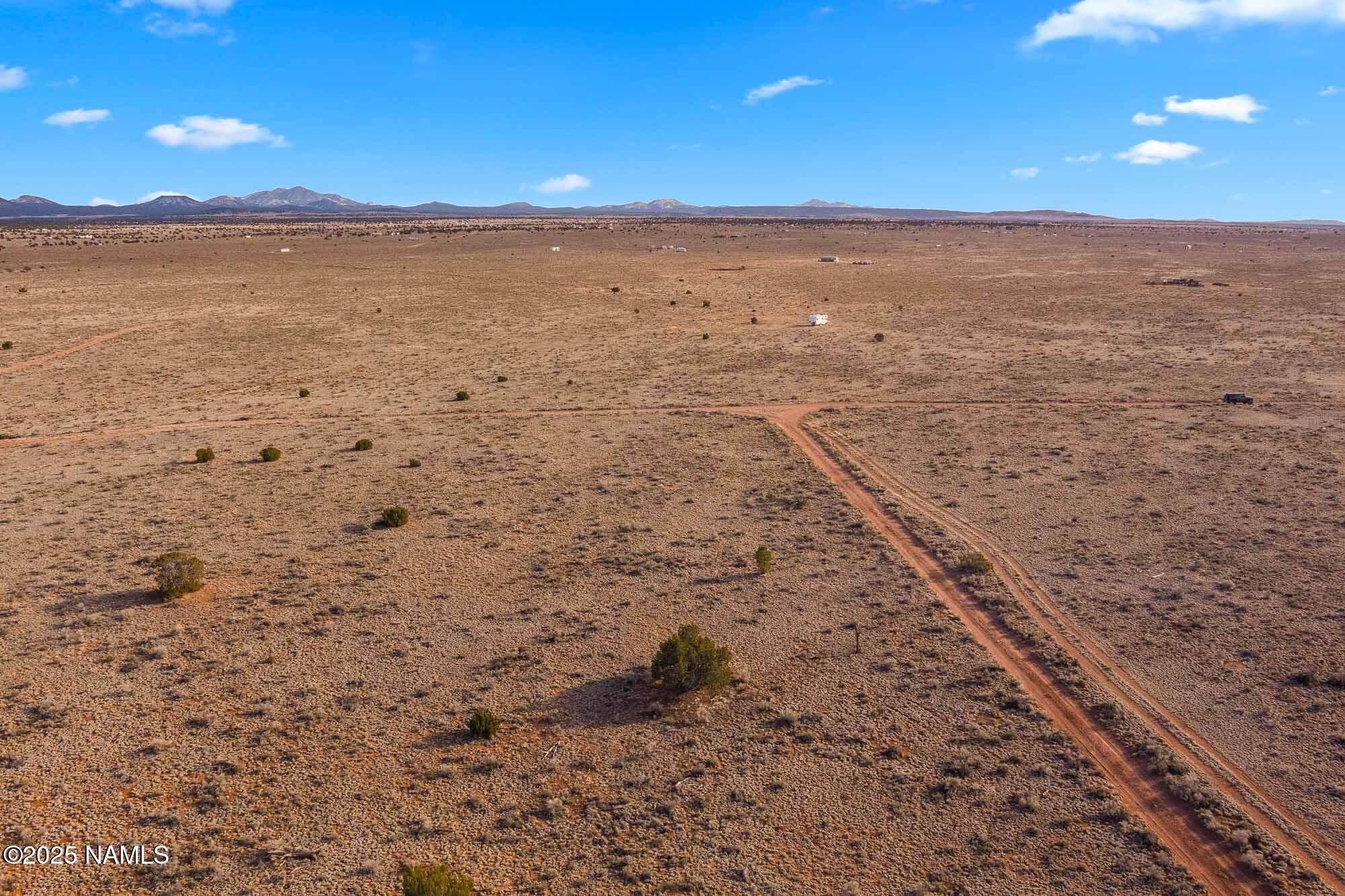 2549 Valle Road Williams, AZ 86046 - Photo 17 of 19 a view of an ocean beach and mountain