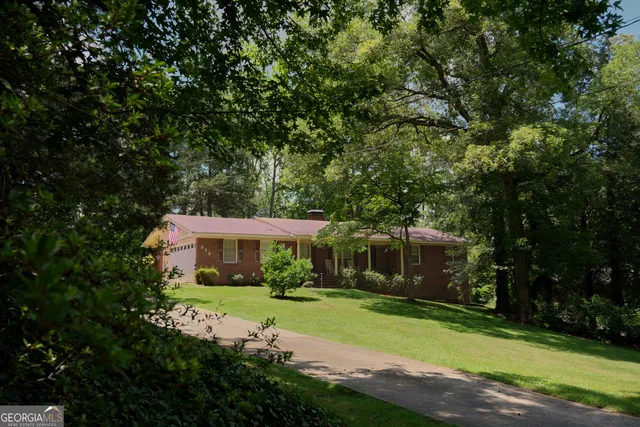 a view of a house with swimming pool