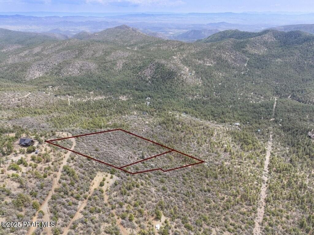 0 East Bald Mountain Road Prescott, AZ 86303 - Photo 3 of 18 a view of a dry yard with mountains in the background