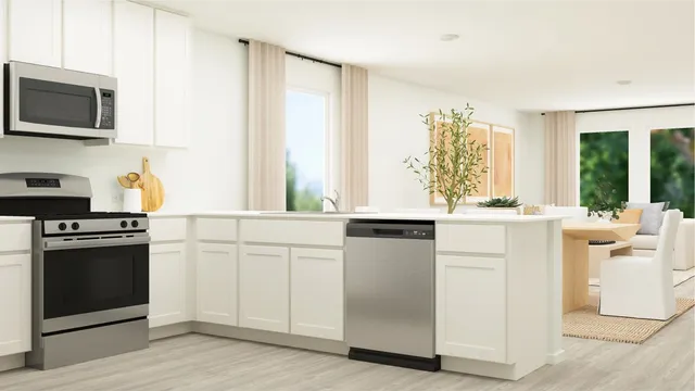 a kitchen with a stove and a refrigerator