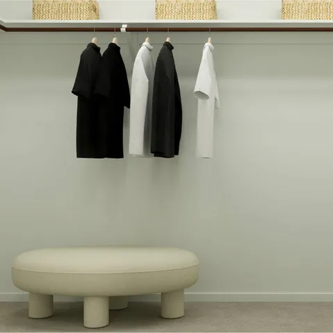 a spacious bedroom with a bed and window