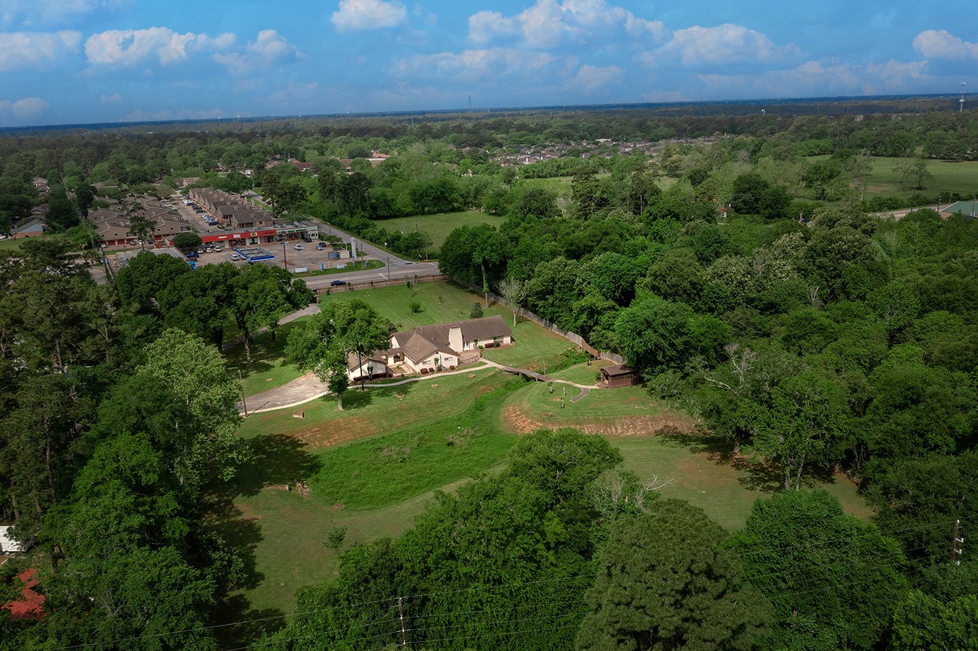 23218 Aldine Westfield Road Spring, TX 77373 - Photo 47 of 47 an aerial view of residential houses with outdoor space and trees