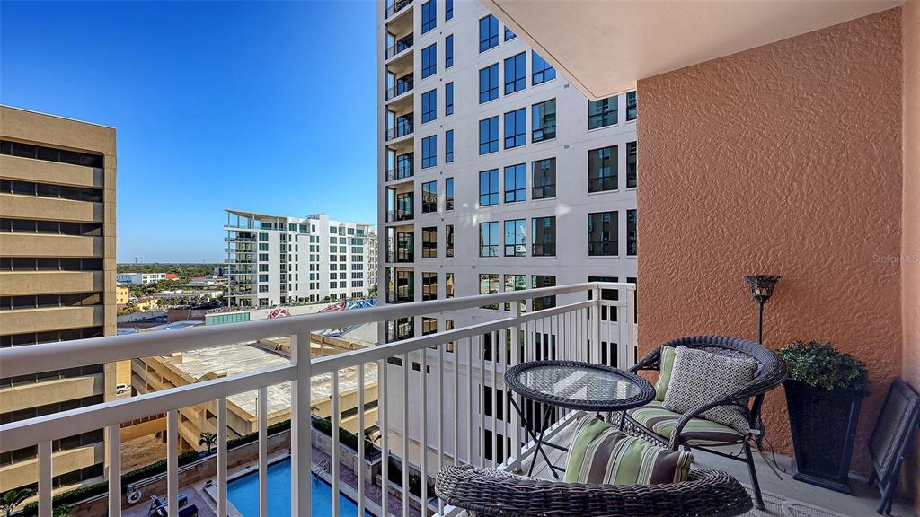 1350 Main Street, Unit 1007 Sarasota, FL 34236 - Photo 11 of 48 a view of a balcony with chairs