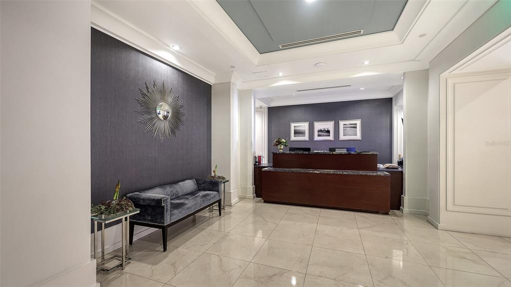 1350 Main Street, Unit 1007 Sarasota, FL 34236 - Photo 32 of 48 a living room with furniture and a window