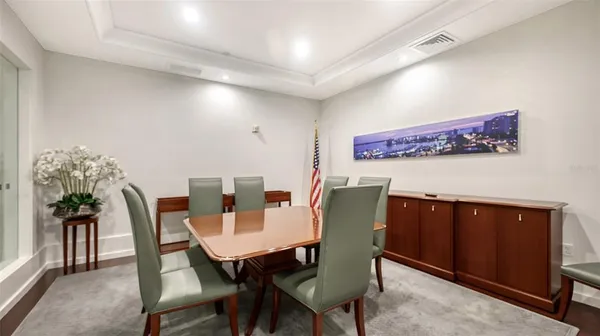 a view of a dining room with furniture