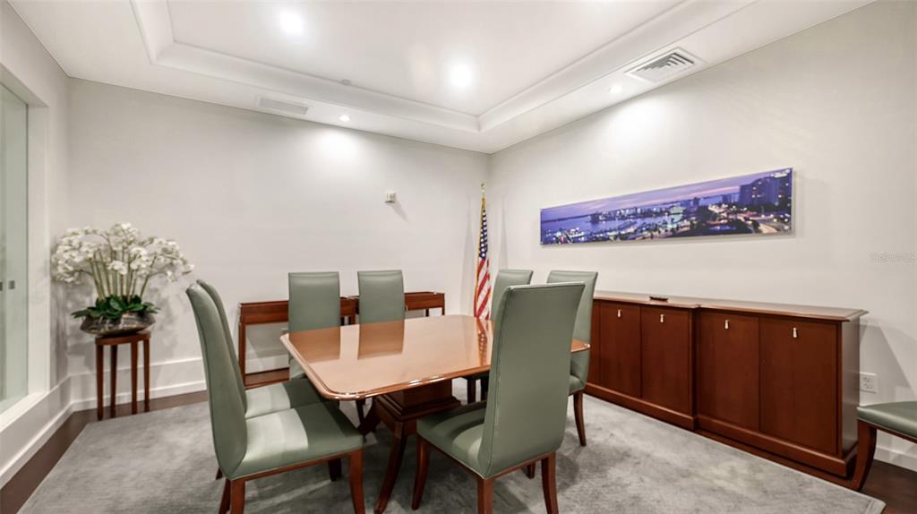1350 Main Street, Unit 1007 Sarasota, FL 34236 - Photo 42 of 48 a view of a dining room with furniture