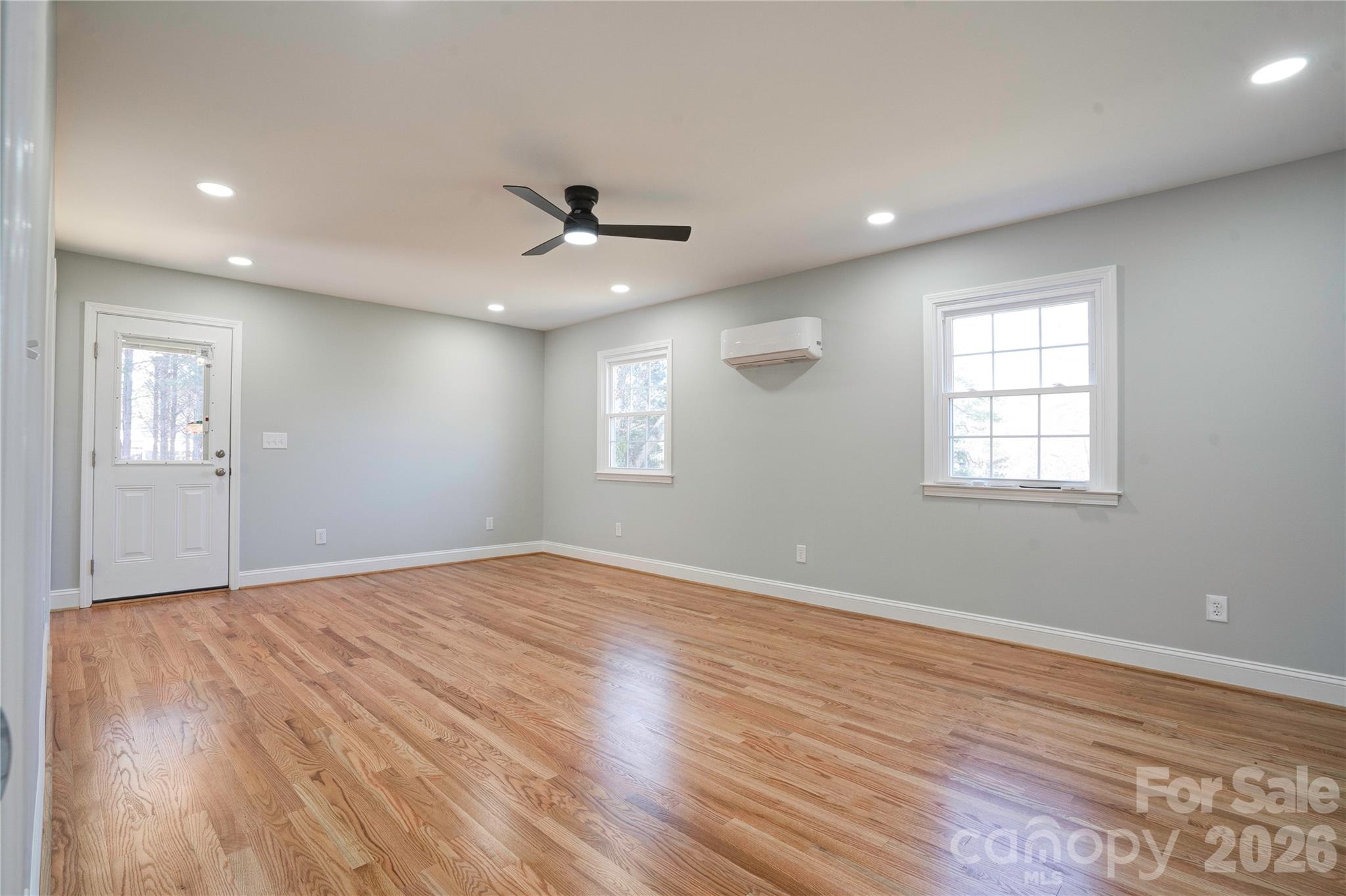 2822 Bettis Road Grover, NC 28073 - Photo 25 of 32 a view of empty room with wooden floor and fan