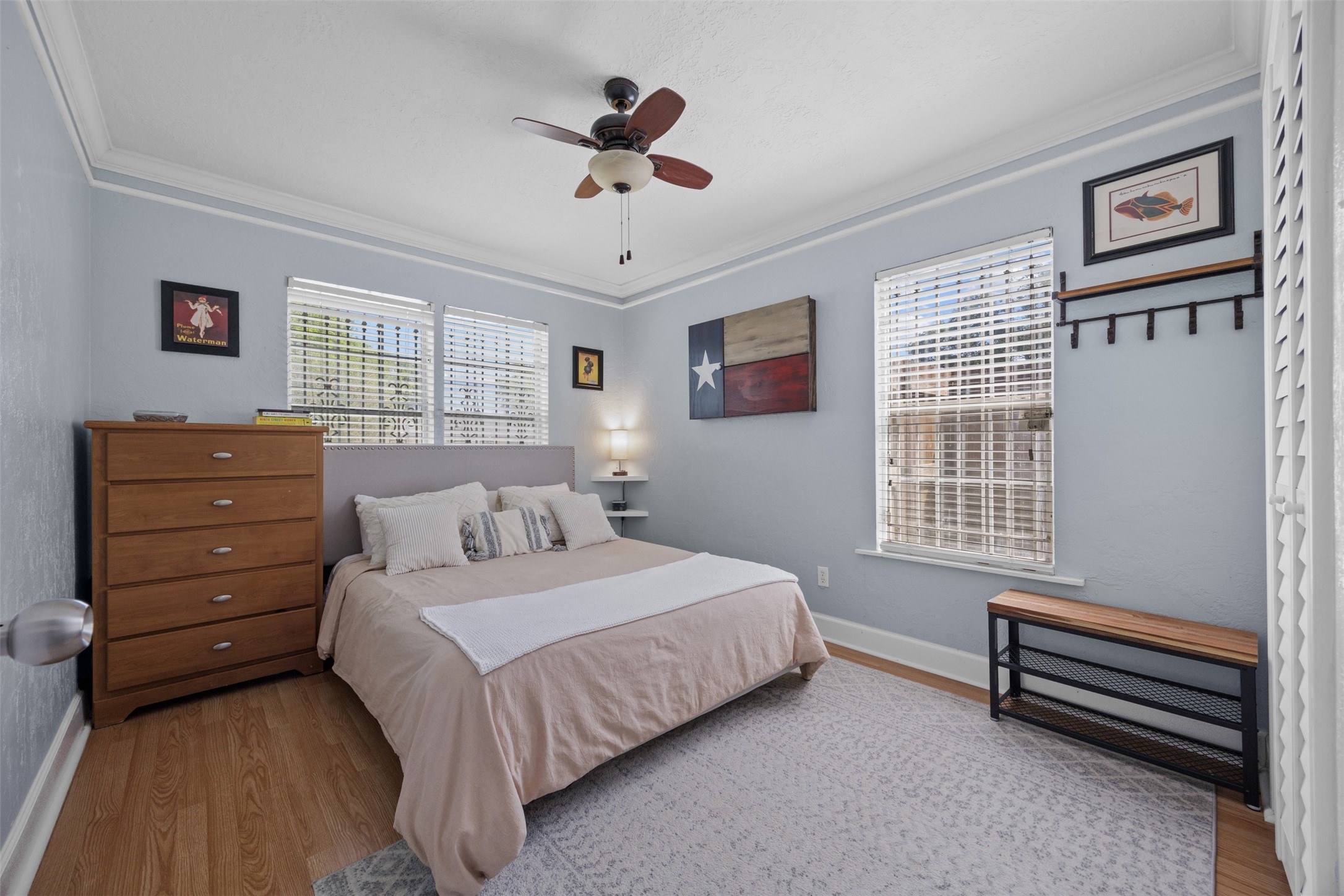 5874 Beldart Street Houston, TX 77033 - Photo 14 of 37 Largest bedroom in the home, easily fitting a king-size bed with space to relax and unwind. This is currently the primary bedroom.
