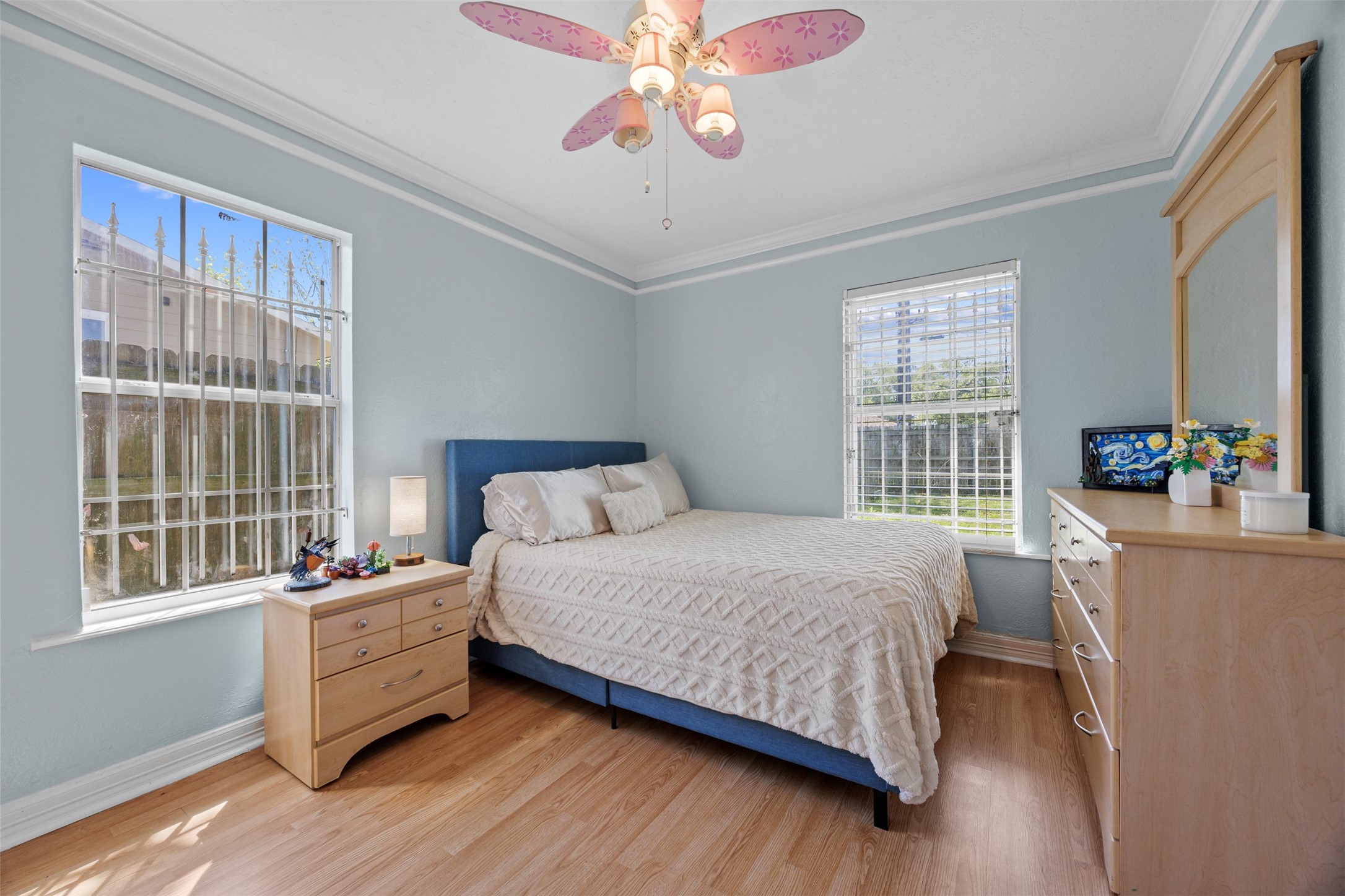 5874 Beldart Street Houston, TX 77033 - Photo 17 of 37 Spacious secondary bedroom number two with great natural light—perfect for guests, a home office, or everyday living
