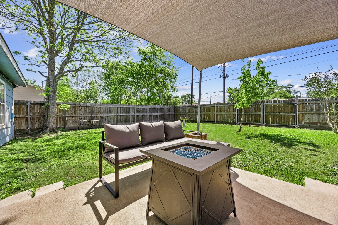 5874 Beldart Street Houston, TX 77033 - Photo 19 of 37 Spacious backyard with plenty of green space—perfect for outdoor play or pets.