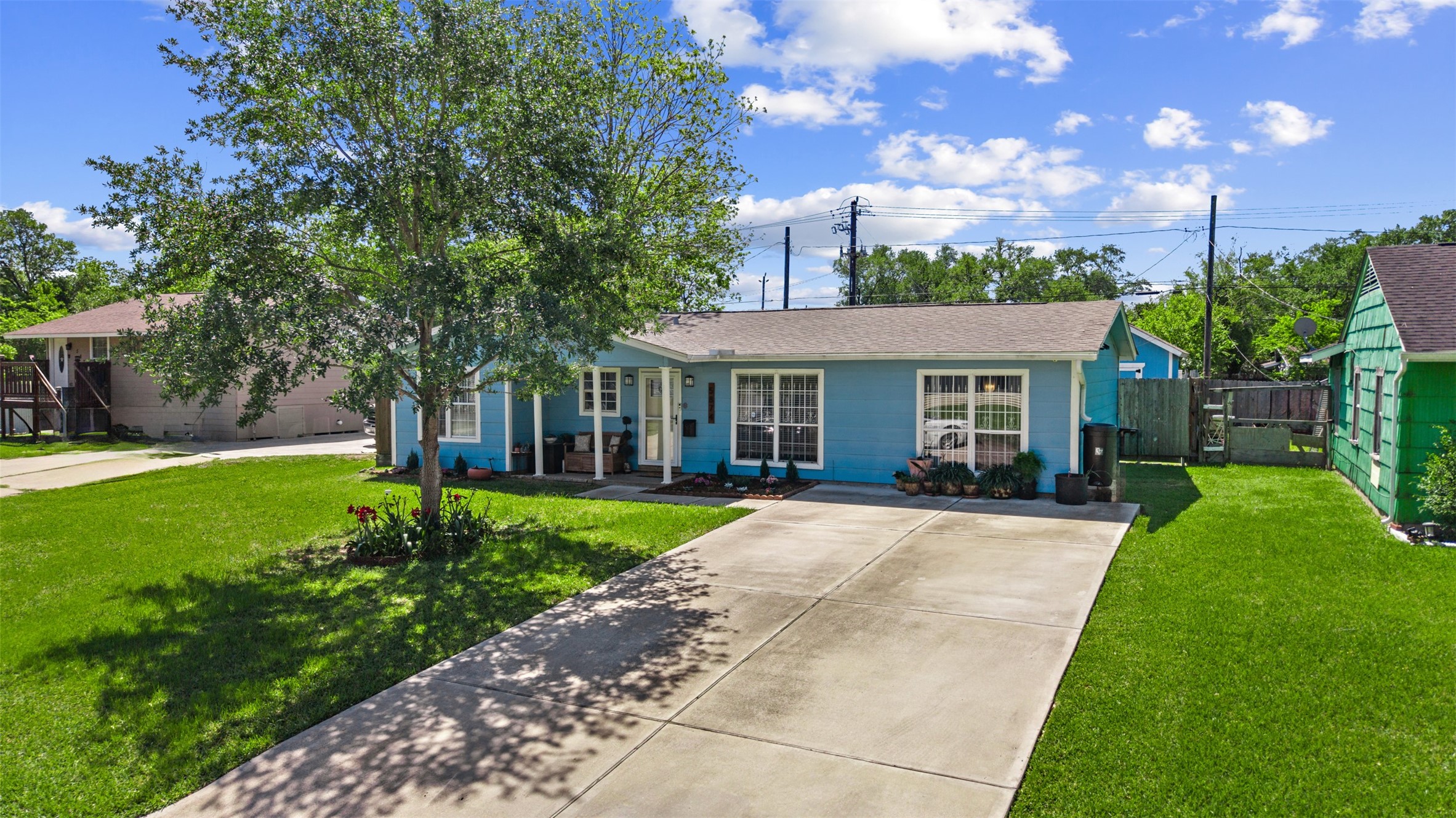 5874 Beldart Street Houston, TX 77033 - Photo 36 of 37 Spacious driveway provides plenty of room for multiple vehicles.