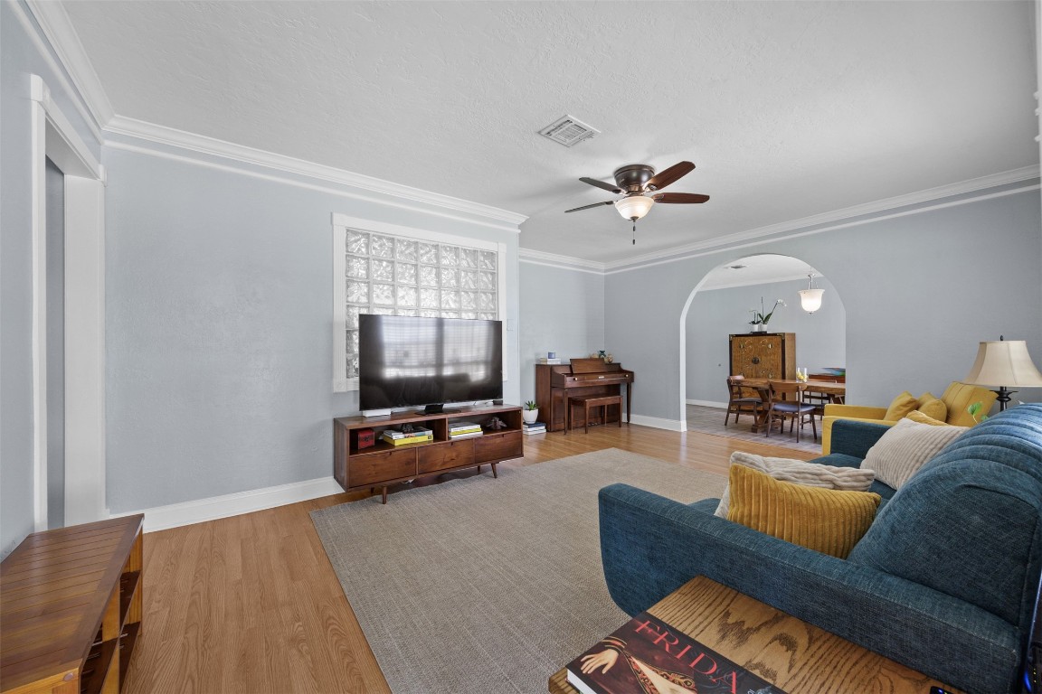 5874 Beldart Street Houston, TX 77033 - Photo 4 of 37 Welcoming entry opens into a bright, open living space filled with natural light.