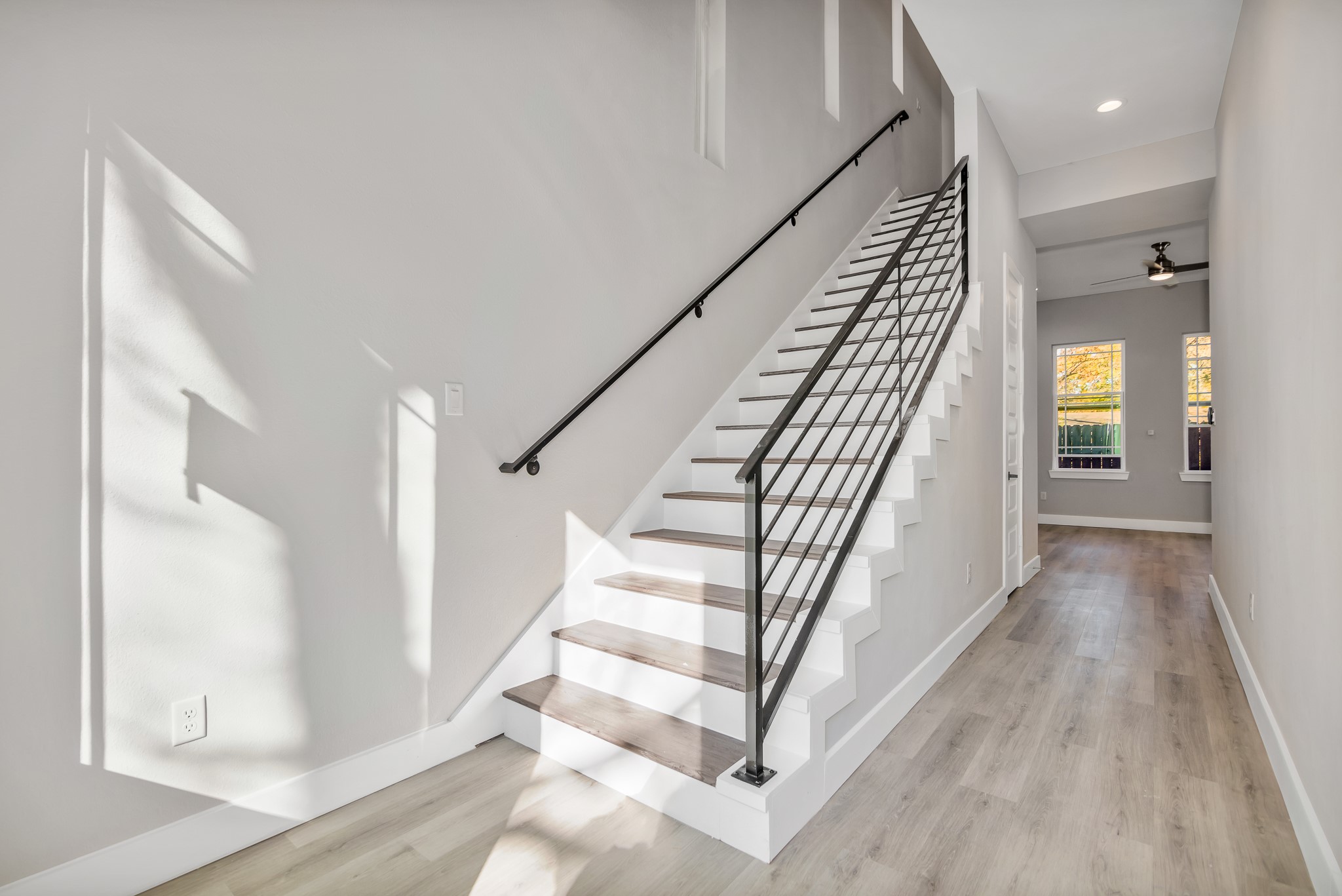 4924 Winnetka Street, Unit A Houston, TX 77021 - Photo 14 of 26 a view of entryway with wooden floor and stairs
