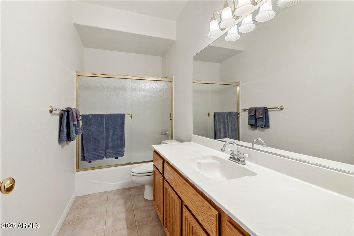 528 Miracle Rider Road Prescott, AZ 86301 - Photo 29 of 47 a bathroom with a sink a toilet and shower