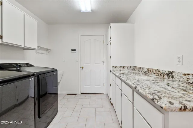 a kitchen with a stove and a sink