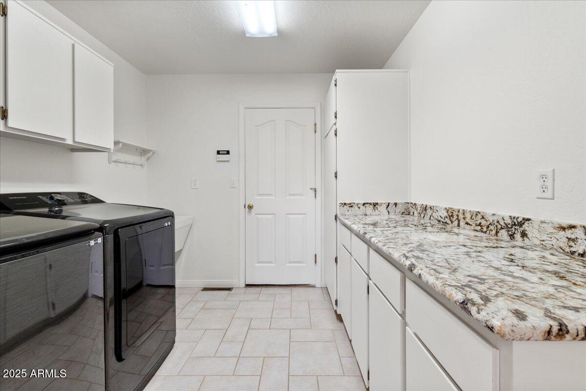 528 Miracle Rider Road Prescott, AZ 86301 - Photo 31 of 47 a kitchen with a stove and a sink