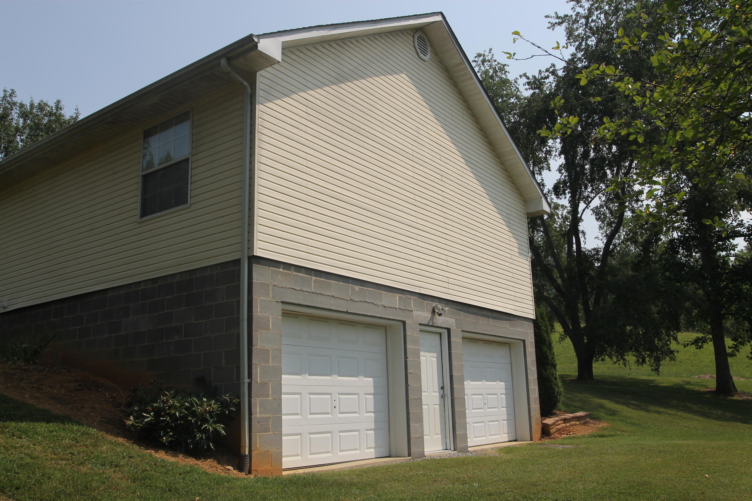 201 Cobb Road Surgoinsville, TN 37873 - Photo 4 of 39 Basement Outside